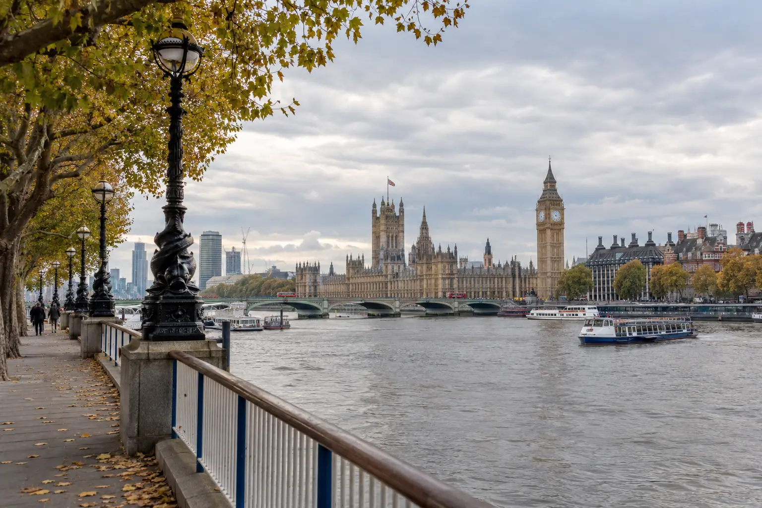 Illustration of London riverside buildings beside the Thames.