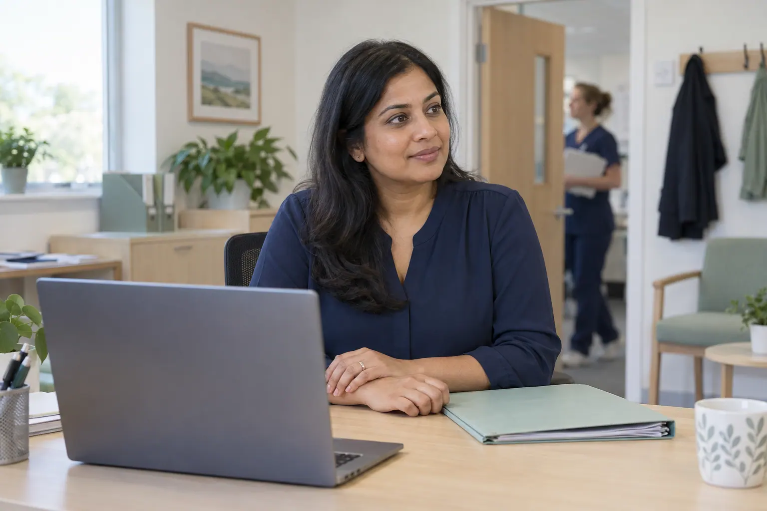 Illustration of a clinical pharmacist at a desk in a GP practice office.